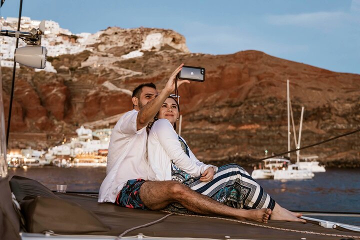 Santorini Catamaran Cruise with Swim-Stops, Greek Meal and Sunset