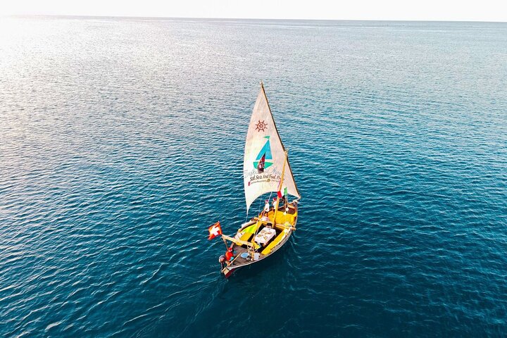 Exclusive private full-day Dhow sail & snorkel Mnemba sandbank