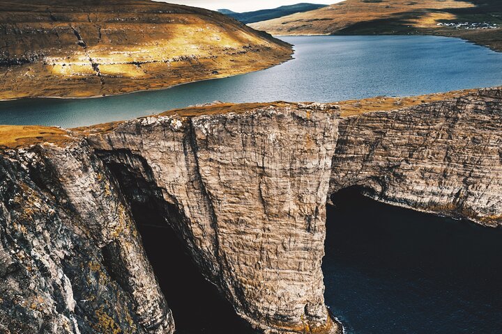 Full Day Vágar Island Tour Including Slave Cliff Hike