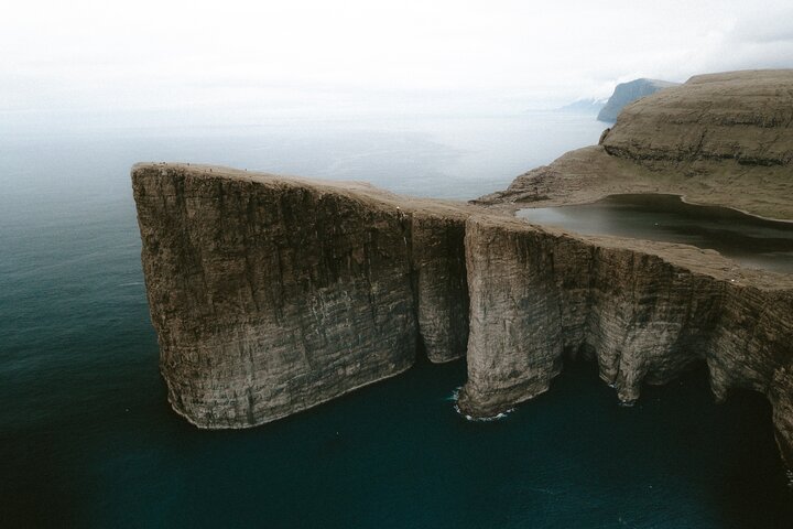 Full Day Vágar Island Tour Including Slave Cliff Hike