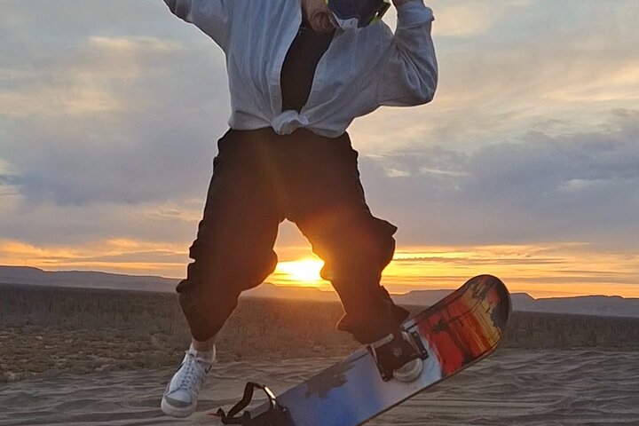 Sandboarding in the Mogote Sand Dunes in La Paz