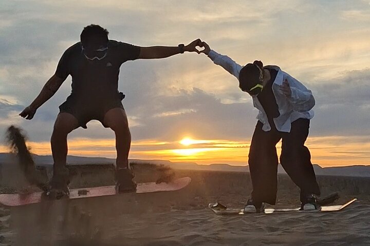 Sandboarding in the Mogote Sand Dunes in La Paz