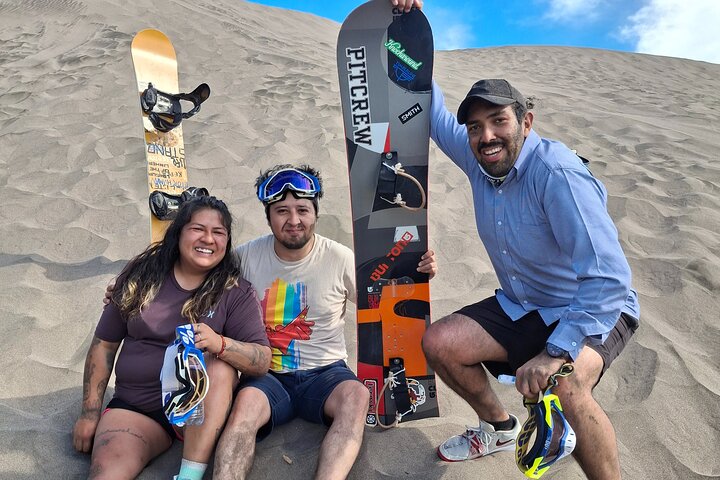 Sandboarding in the Mogote Sand Dunes in La Paz
