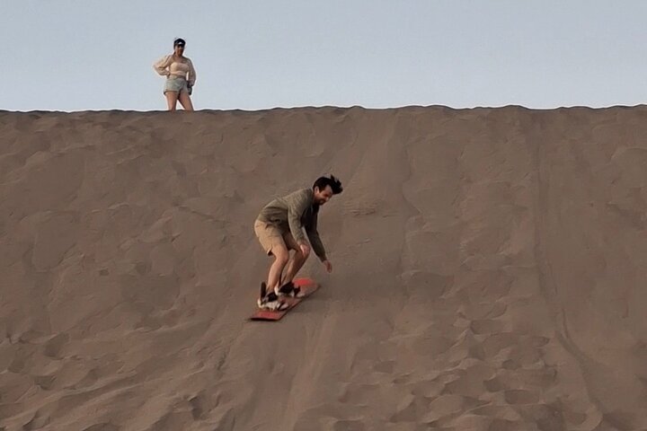 Sandboarding in the Mogote Sand Dunes in La Paz