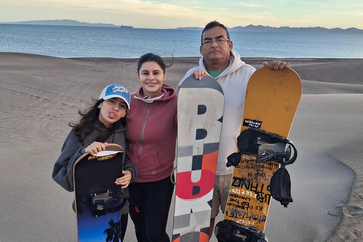 Sandboarding in the Mogote Sand Dunes in La Paz