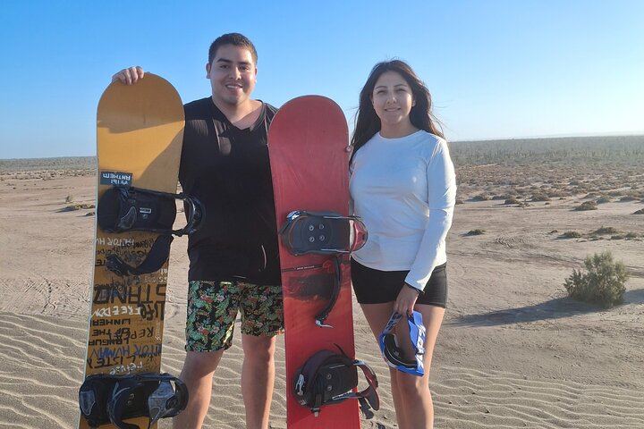 Sandboarding in the Mogote Sand Dunes in La Paz