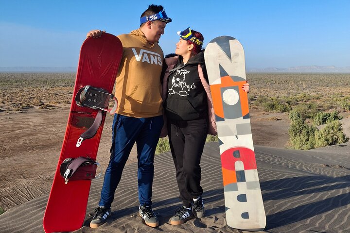 Sandboarding in the Mogote Sand Dunes in La Paz