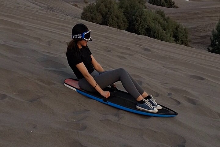 Sandboarding in the Mogote Sand Dunes in La Paz