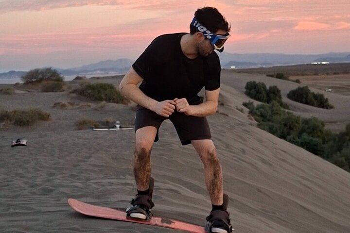 Sandboarding in the Mogote Sand Dunes in La Paz