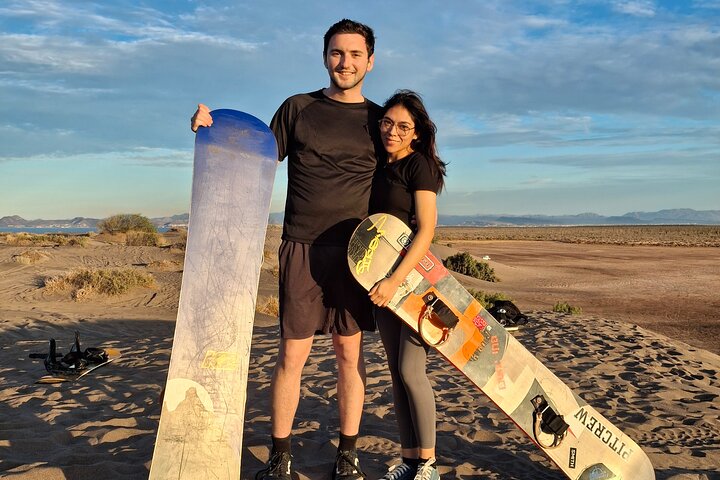 Sandboarding in the Mogote Sand Dunes in La Paz