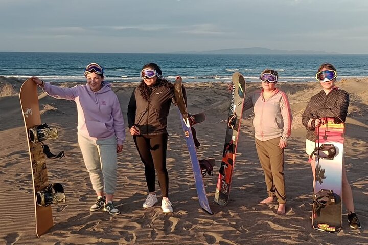 Sandboarding in the Mogote Sand Dunes in La Paz