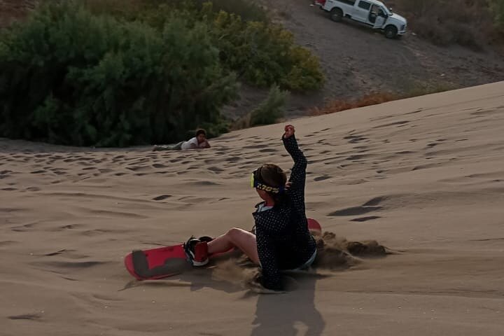 Sandboarding in the Mogote Sand Dunes in La Paz