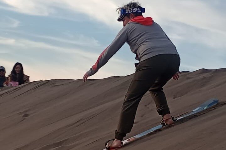 Sandboarding in the Mogote Sand Dunes in La Paz
