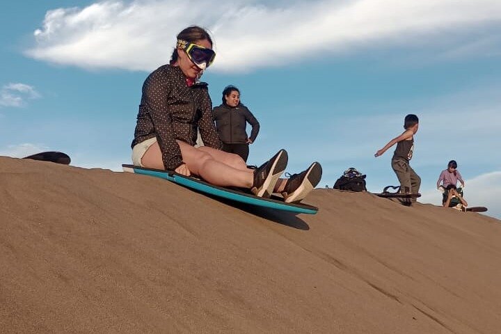 Sandboarding in the Mogote Sand Dunes in La Paz