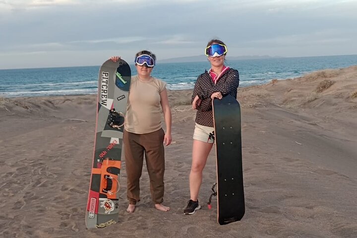 Sandboarding in the Mogote Sand Dunes in La Paz