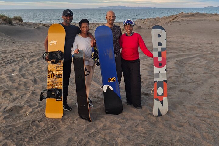 Sandboarding in the Mogote Sand Dunes in La Paz