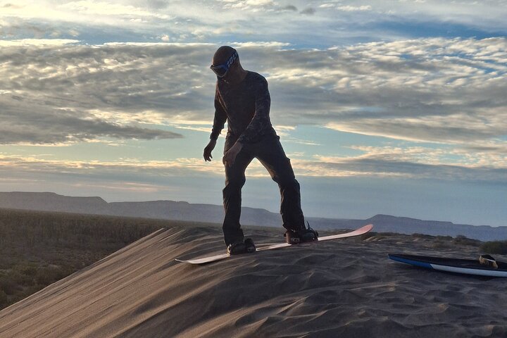 Sandboarding in the Mogote Sand Dunes in La Paz