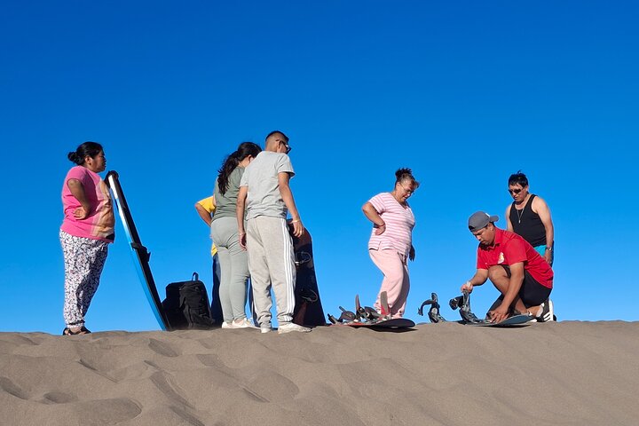 Sandboarding in the Mogote Sand Dunes in La Paz