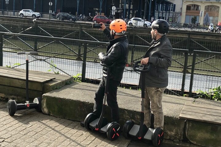 Unusual and ecological ride on a Segway and electric bike in Bayonne