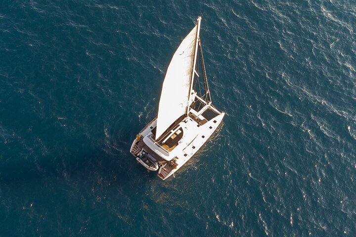 Mykonos Catamaran Sunset Cruise with Meal, Drinks & Transfer