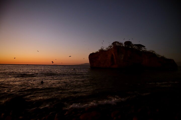 Sunset and Bioluminescence Boat Tour at Los Arcos Islands