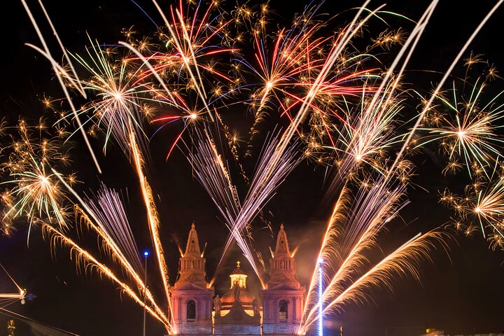Traditional Village Feast and Fireworks Roundtrip Transportation