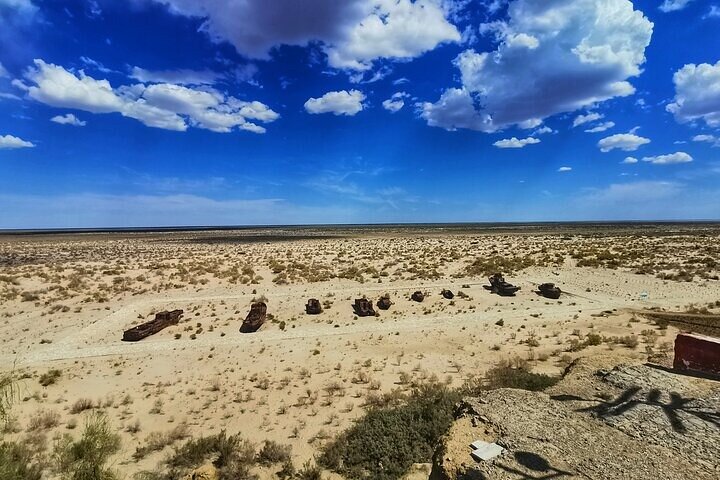 Experience a Breathtaking Sunset at Aral Sea with Friendly People