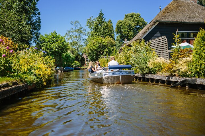 Boat Rental with Steering Wheel and Cushions