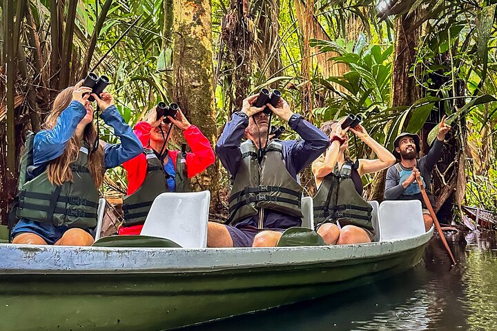 Tortuguero Sunrise Canoe Tour – Coffee, Binoculars & Wildlife