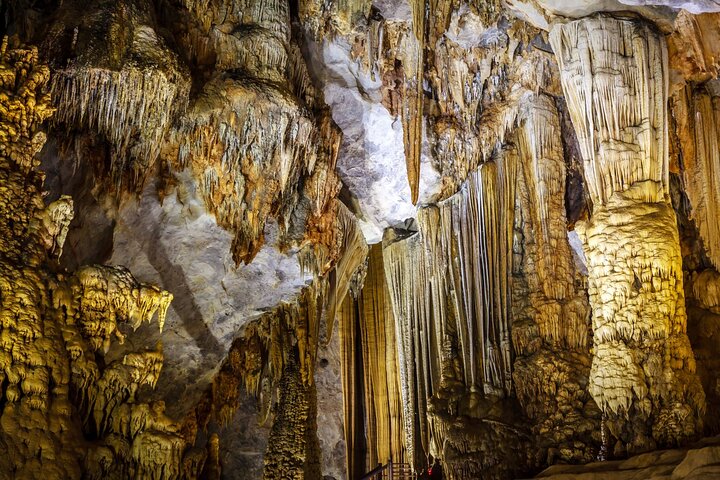 From Hue: Paradise Cave and Dark Cave Day Tour