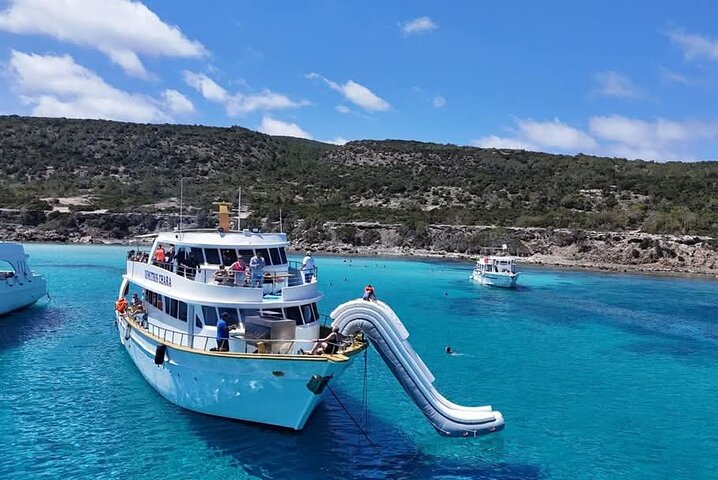 Demetris Chara Boat/Blue Lagoon boat trips with BBQ and SLIDE