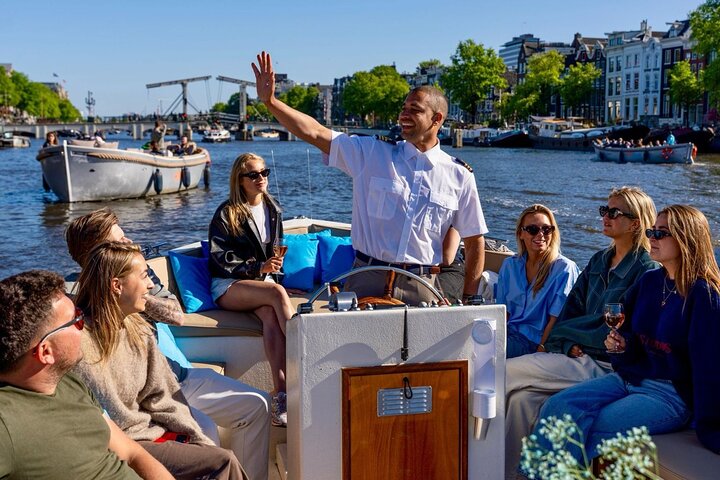 Amsterdam Canal Cruise in Open Boat with Unlimited Drinks Option