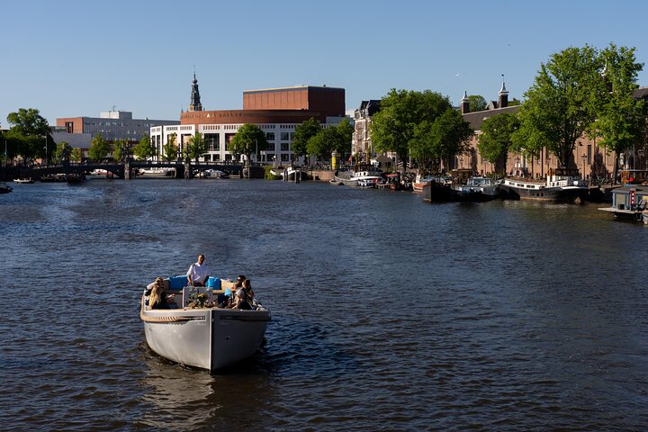 Amsterdam Canal Cruise in Open Boat with Unlimited Drinks Option
