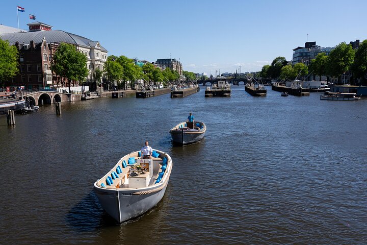 Amsterdam Canal Cruise in Open Boat with Unlimited Drinks Option