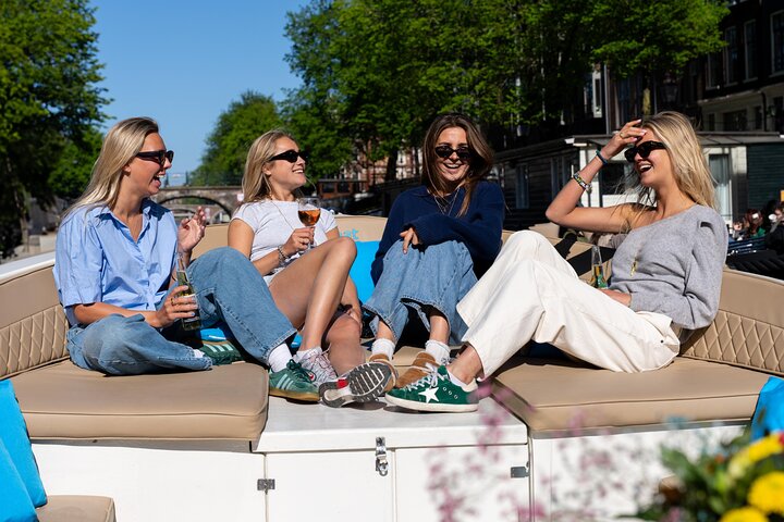 Amsterdam Canal Cruise in Open Boat with Unlimited Drinks Option