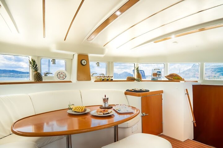 Catamaran tour Magdalene Archipelago from Cannigione from 12 mt..