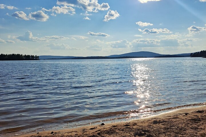 Lake Inari Boat Tour with Ice Cave and Campfire