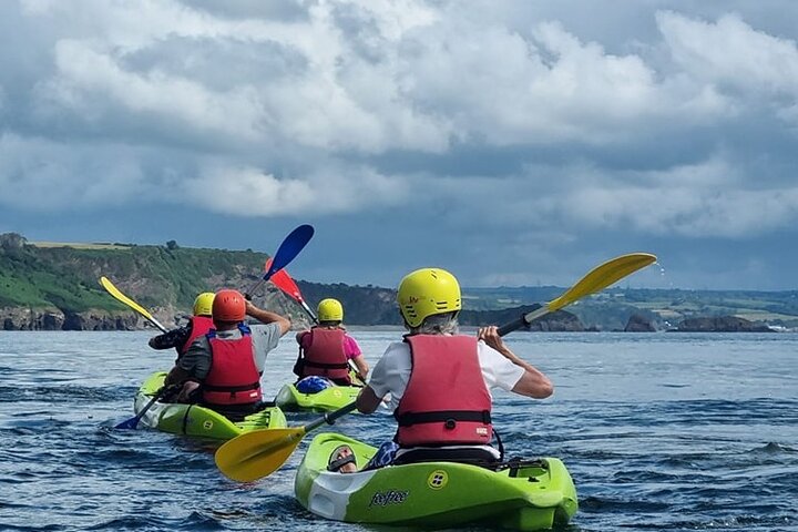 Guided kayaking trip exploring the secrets of the Tenby coastline
