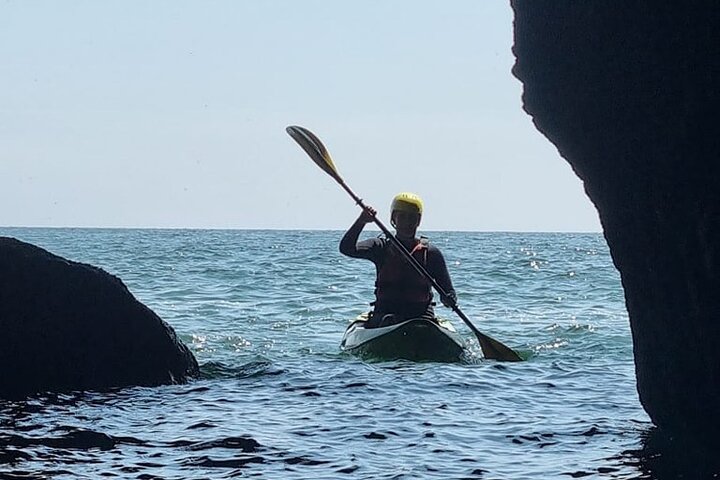 Guided kayaking trip exploring the secrets of the Tenby coastline