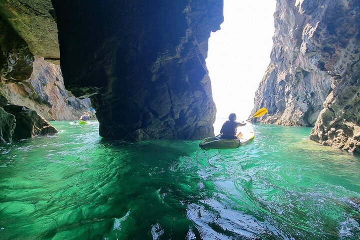Guided kayaking trip exploring the secrets of the Tenby coastline