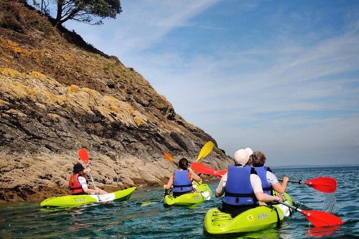 Guided kayaking trip exploring the secrets of the Tenby coastline