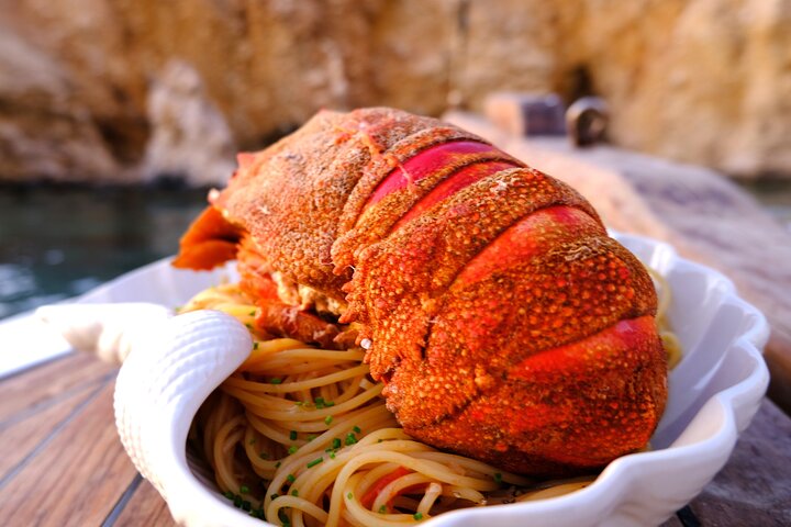Private Cruise: Explore Rina’s Cave & Enjoy Fresh Seafood Onboard