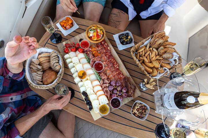Luxury Private Boat to Ponta de Piedade + paddleboarding