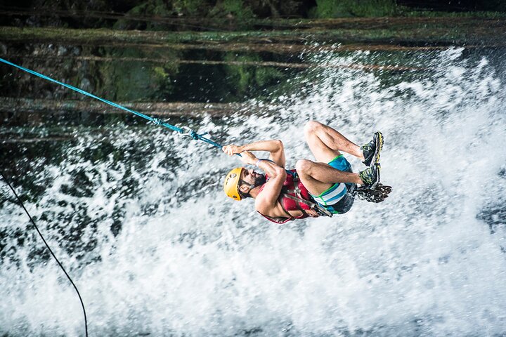 Guachipelin Waterfall Canyoning rappel- rock climbing + lunch