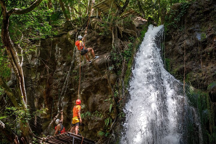 Guachipelin Waterfall Canyoning rappel- rock climbing + lunch