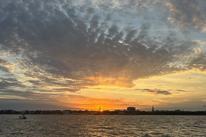 Charleston Harbor Sunset Cruise Scenic Views and Dolphin Spotting