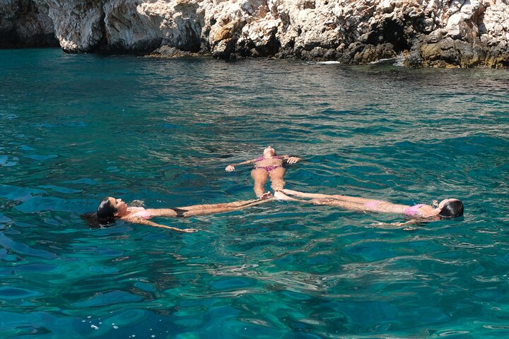 Private Cruise: Explore Rina’s Cave & Enjoy Fresh Seafood Onboard
