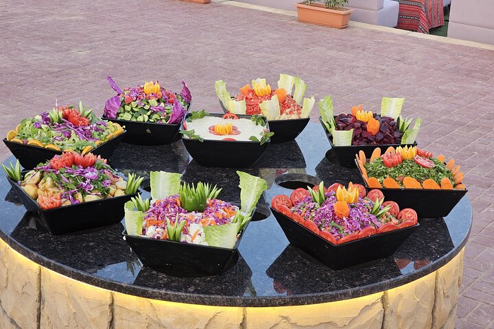 Evening Desert Safari Dubai with Camel Ride & BBQ dinner