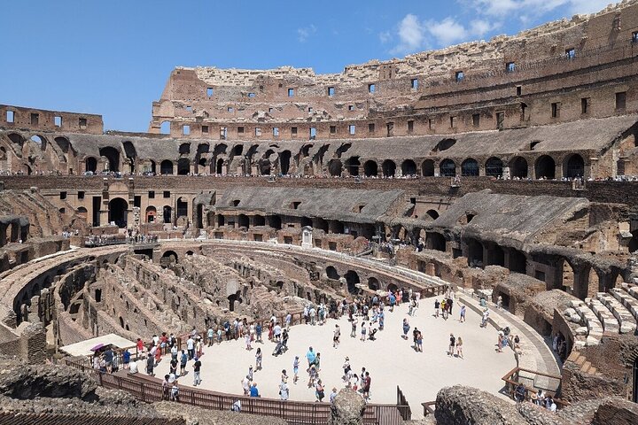 Rome: Colosseum, Forum & Palatine with Arena Access + Audio Guide