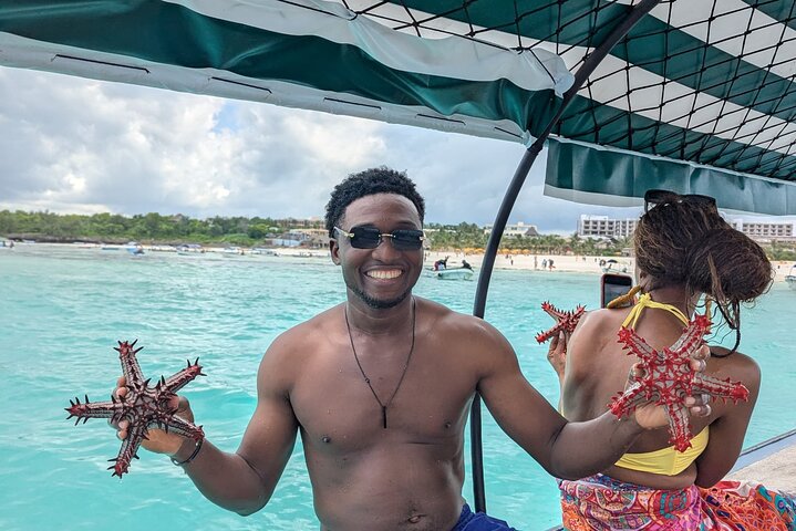 Swim, Smile and Sunset Mnemba Island and Turtle Experience
